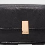 Eteini-black